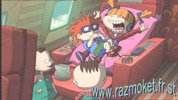 Chuckie falls into Angelica's lap