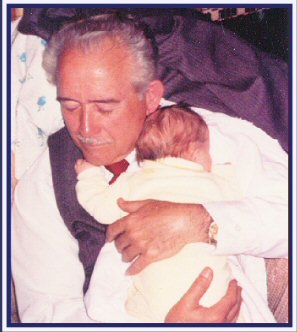Daddy with Lena Judith. José M. Oxholm's,1st grandchild, the daughter of Nellie Ann Drake. Both Dream... There are now eleven (12)grandchildren as of 2005