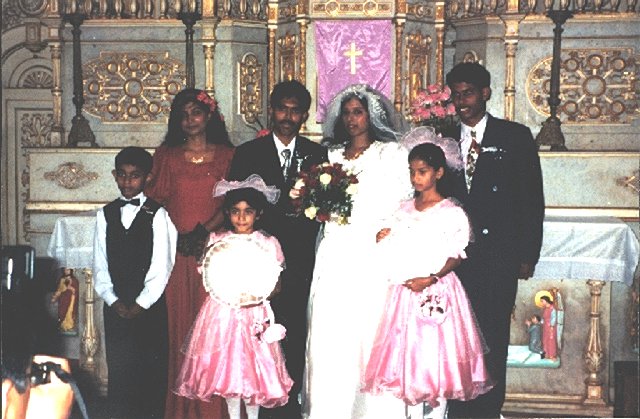 Maria and Dennis at the Alter of St. Thomas Church Aldona