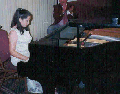 Elisabeth plays the piano