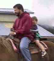Daddy and Ben on a horse in Olympia, USA