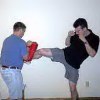 JJ holds for Ray's muay thai kickClick to see more muay thai action