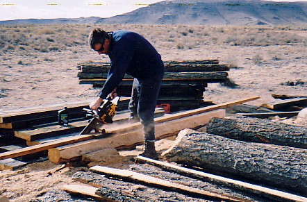 Milling D logs with a chain saw