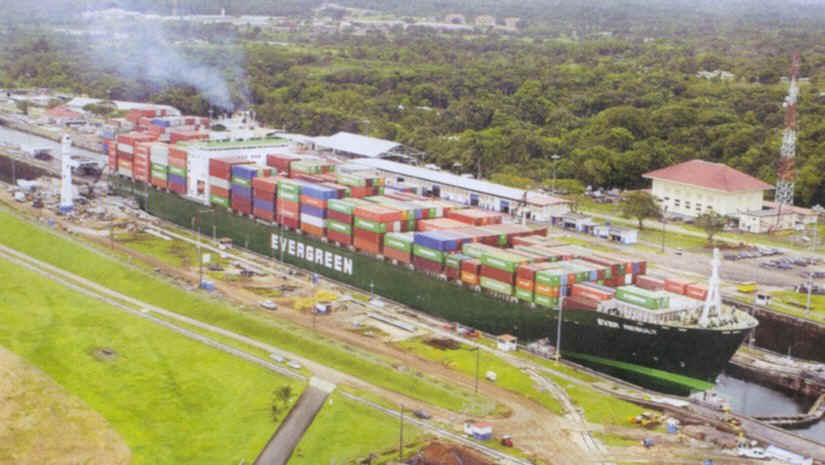 Container ship transiting Gatun Locks, the only set of locks of the Panama Canal on the Atlantic side of the isthmus of Panama. [Courtesy of  Panama Canal Authority from its El Foro newsletter, 17-30 October 2003]