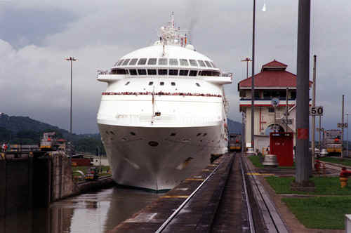 Passenger cruise ship transiting Miraflores Locks -- Since 2000, several cruise ships have been docking in Panama at Cristobal (on the Atlantic side) or more recently also at Flamenco Island (on the Pacific side) for a day or two as part of their cruise schedules [Source:  Panama Canal Authority website, www.pancanal.com]