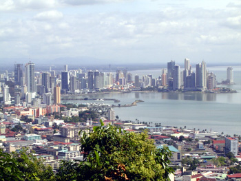 Panama City (shortly after 2000)-- Areas of Balboa Boulevard, Bay of Panama, banking area in Marbella (left background), and Paitilla (the latter in the right background) -- photographed from top of Ancon Hill.  Older parts of the city are in the foreground. The lone high-rise building on the far right background (to the right and behind Paitilla area) was the beginning of the new Punta Pacifica area created by landfill of area near the site of the former Paitilla airport now at Albrook.  [Photo courtesy of Inteoceanic Region Authority (ARI) website, www.ari.gob.pa]