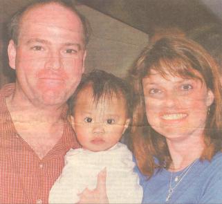 Glenn and his partner, Shelley Page in southern China with their baby girl, Scarlet Jun Ni McGregor Page.