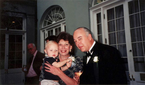 This is my husband, Francis Moore, and I,  
with our second oldest
grandchild, Devon Moore.   The date is May 22, 1999, Hotel Sonesta 
Royal, Burbon St, New Orleans, LA.  We are at the wedding of our 
daughter, Jennifer Moore.

(Photo property of CELESTE BRINDLE-MOORE)