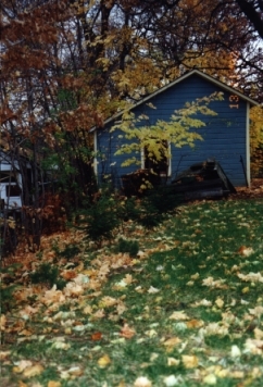a carriage house in autumn