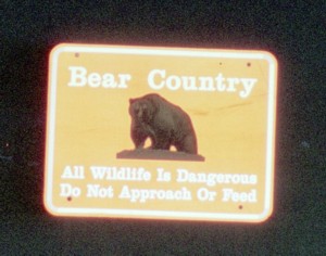 sign posted at Glacier National Park entrances