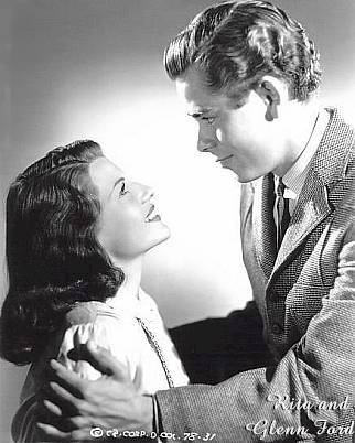 Rita and Glenn Ford as Natalie Rouguin and Pierre Morestan