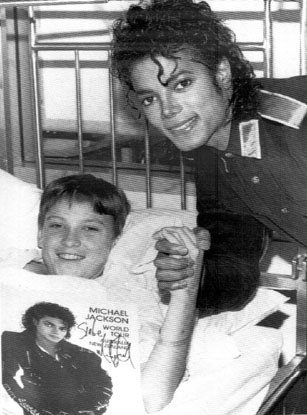 Mike visiting Ryan in the hospital