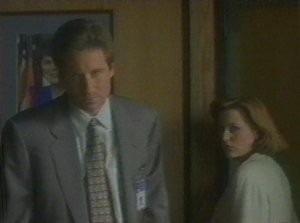 If looks could kill...  Mulder faces off with Skinner and comes up empty.  Again.