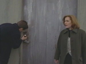 To aggravate the crime of trespassing Mulder indulges in a little breaking and entering.