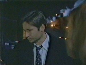 Mulder all but runs to get away from the inquiries of his partner. God forbid he should offer the woman an explanation.