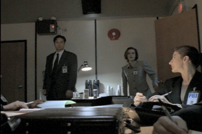 Once again Mulder makes an impression by arriving to a meeting -late.