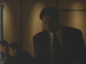 Mulder blows Scully off when she tries to get his attention after the meeting. For some strange reason he thinks this will keep her from pursuing her line of inquiry. How long has he been working with her?