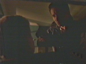 Once again Mulder shoves a gun in CSM's face. Even CSM doesn't think Mulder will pull the trigger.