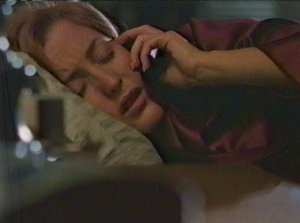 Poor Scully, tricked into flying to Vegas by a late night call. Of course if Mulder didn't constantly call her at such ungodly hours she might have been suspicious of the call in the first place.