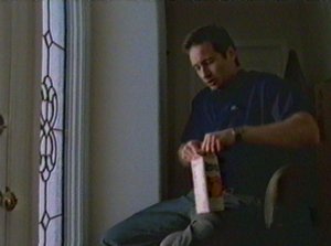 Mulder nearly uses the empty juice carton for a most disgusting of alternate uses.