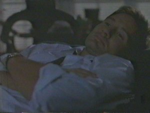 Having forgotten that he's currently occupying the body of a man who is married with children Mulder foolishly decides to lull himself to sleep with the soothing sounds of porn.