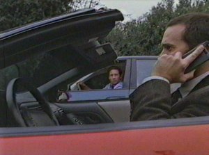 Mulder draws attention to himself in an investigation in which he is not supposed to be participating by following Wayne even while the other man speeds along the road.