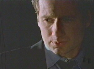 Mulder can't seem to help himself. After the woman kills the father of her son he throws desires of second chances back in her face. Very smooth!