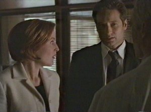 Once again Mulder choses a very bad time to expound on one of his theories.