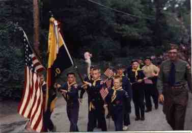 parading Cub Scouts