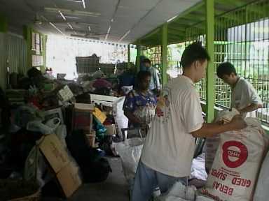 XPM member sorting out the recyclable material