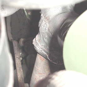 Exhaust manifold connection from right side.