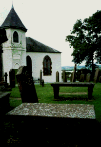 Balmaghie Church with Covenanter tombstone to the two David Hallidays