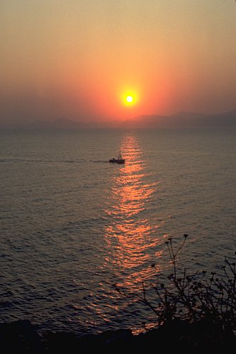 Sunset with fishing boat