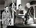 Jackie Cochran and Chuck Yeager being presented with the Harmon International Trophies by President Eisenhower. Courtesay AFFTC History Office