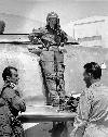 Jackie Cochran standing on the wing of her F-86 whilst talking to Chuck Yeager and Canadair's chief test pilot Bill Longhurst. Courtesay AFFTC History Office