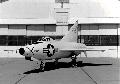 XF-92A in front of historic hangar at Edwards AFB