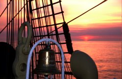 sunset through ship's rigging