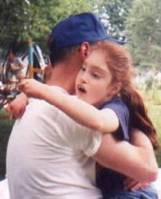 Monica Price and dad hugging