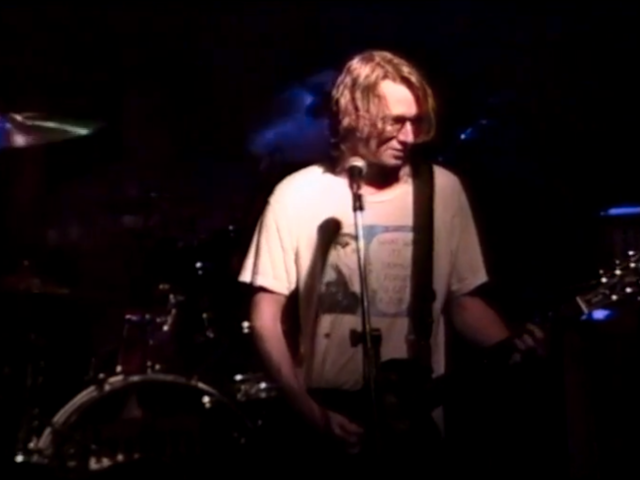 Video still of HUM playing "Hello Kitty" live in 1993
