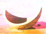 "Iron Clad Lou" video still of a modern art sculpture