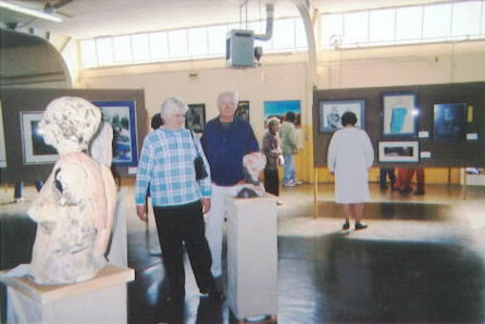 Mr. & Mrs. Stricker viewing a sculpture entered in the ROAR show 2000