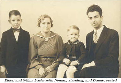 Eldon and Wilma Lucier with their children Noman, standing , and Duane, seated