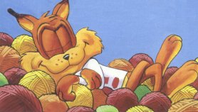 Bubsy sleeping on yarn balls