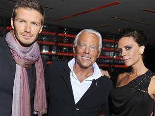 David Beckham, Giorgio Armani and Victoria Beckham at an Armani fashion show