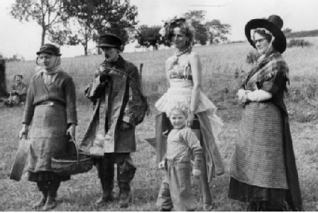  Dylan Thomas’s wife Caitlin dressed as a Can Can dancer at Laugharne Carnival with the couple’s son Colm (centre) taken from the book Dylan Remembered Volume II 1935-1953 