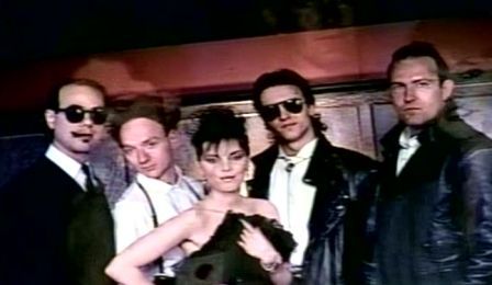 pat, NEIL, and band on set of lipstick lies video