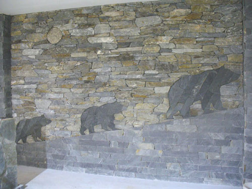 3 bears climbing a mountain masonry wall