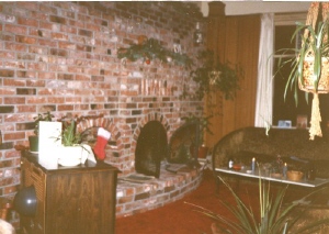 Photo of a large brick fireplace.