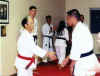 Sensei Keiv Dumlao being promoted to 3rd Dan