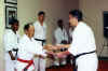 Sensei Mike Quezada being promoted to 3rd Dan